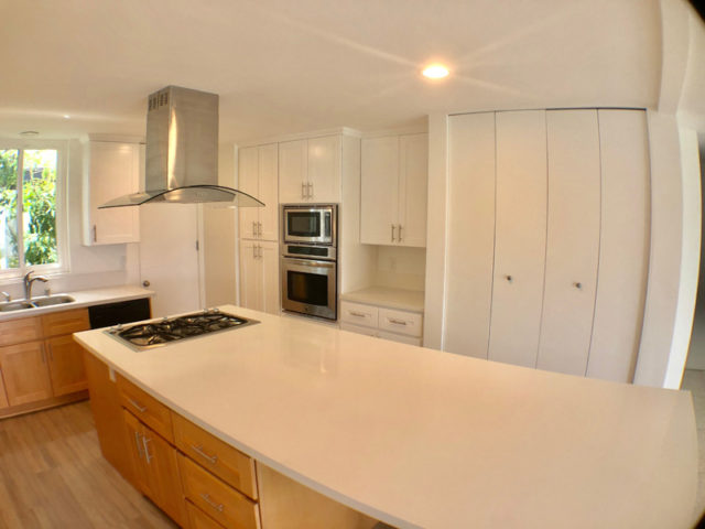 The spacious renovated kitchen in a luxury residence we manage
