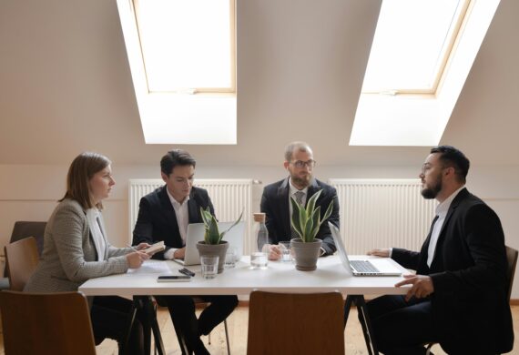 business team negotiating at table