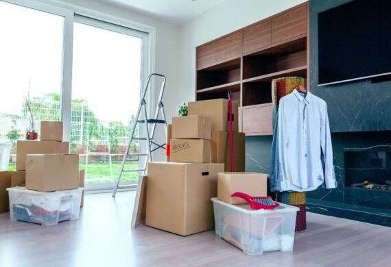 “Tenants packing boxes in Los Angeles apartment”